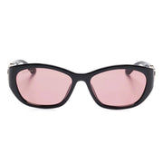 Gucci luxury sunglasses with black frames and pink tinted lenses