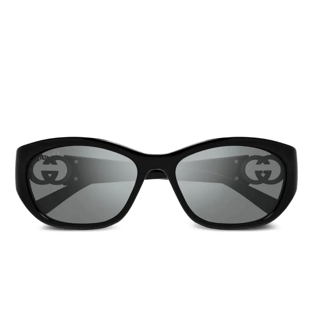 Black Gucci luxury sunglasses with grey lenses and interlocking G logo on the temples
