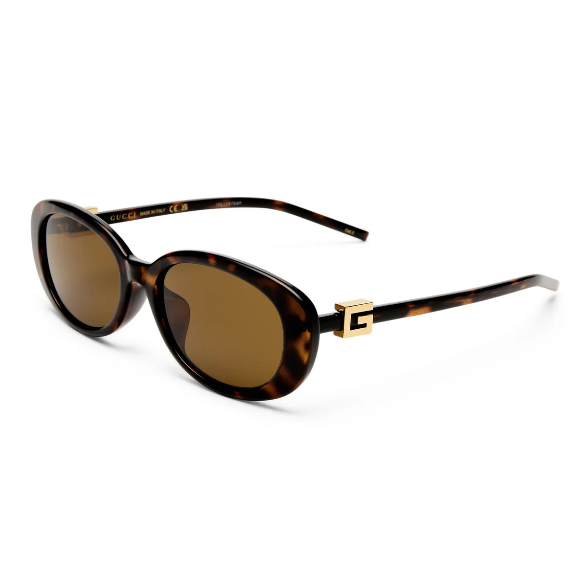Tortoise shell oval sunglasses with gold logo detail and brown tinted lenses
