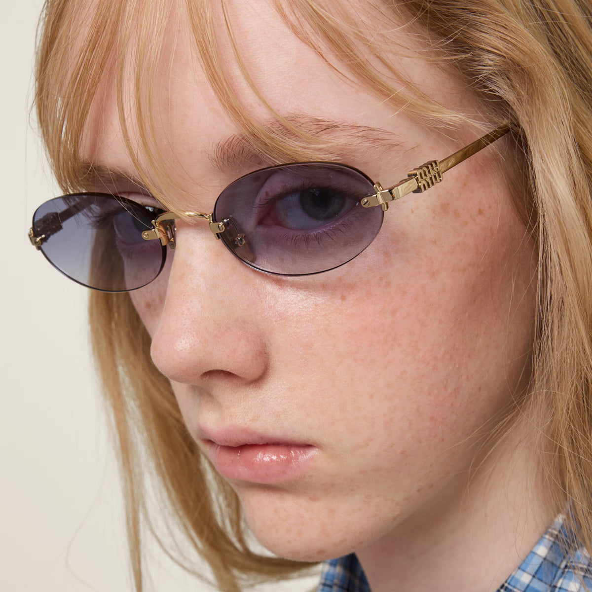 Miu Miu Women Rimless Oval Indigo Sunglasses
