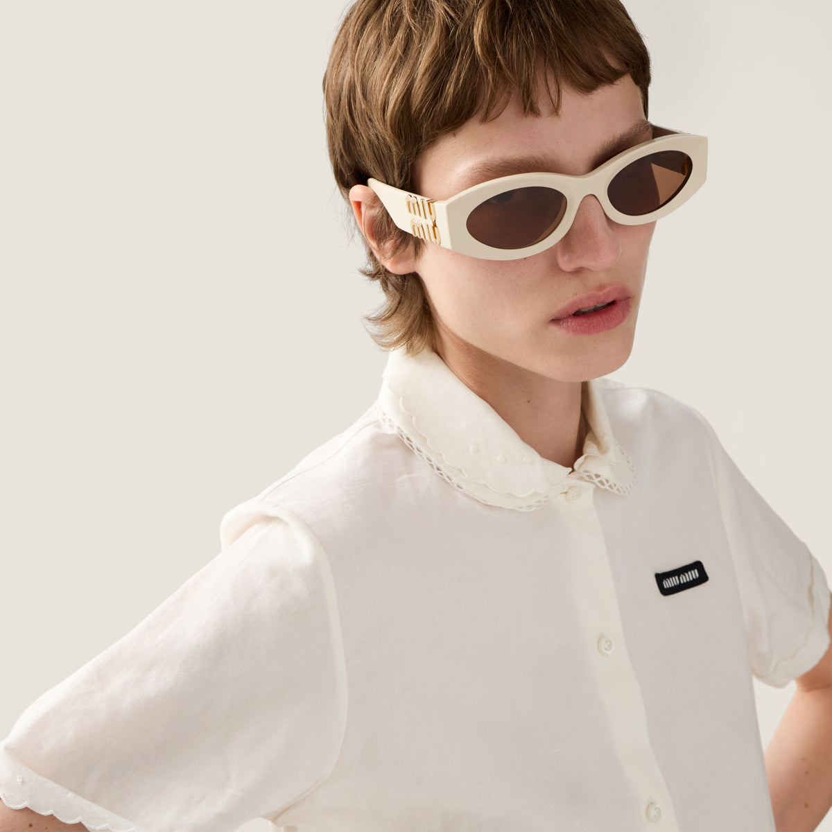Miu Miu Women MU 11WS Glimpse Oval Milky White / Chocolate Brown Sunglasses