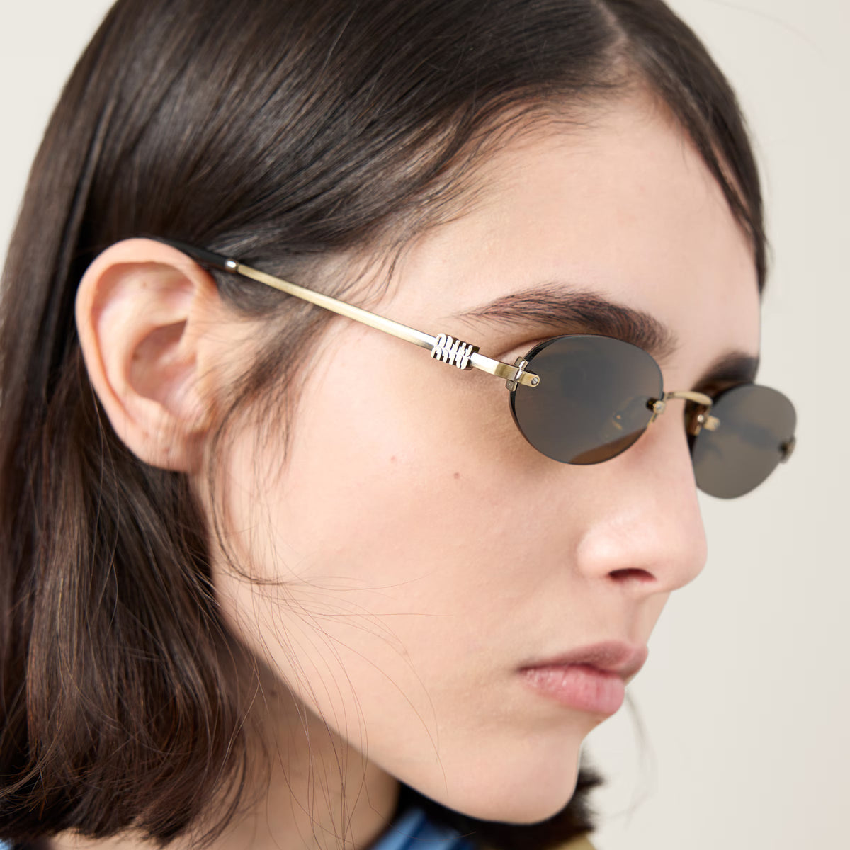 Miu Miu Women Rimless Oval Loden Green Sunglasses