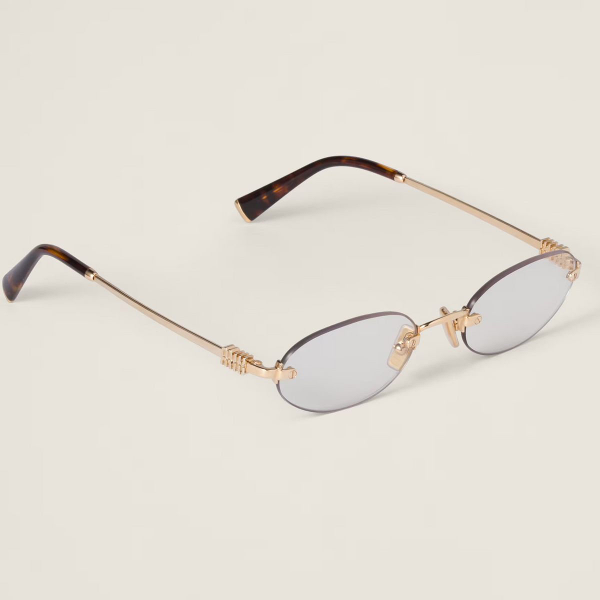Miu Miu Women's MU A54S Rimless Oval – Gold / Clear Blue-ray Transparent Glasses